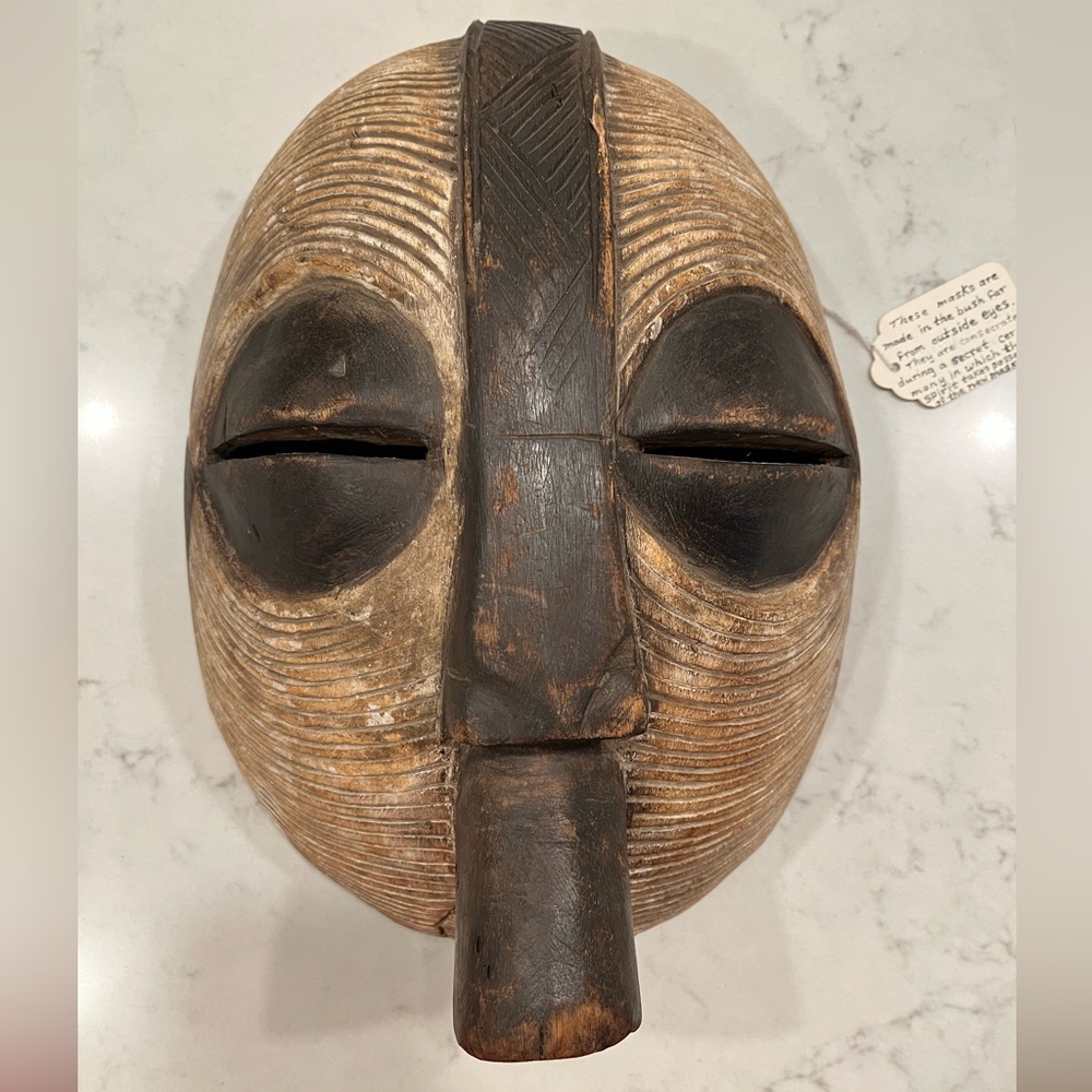 Hand-Carved Tribal Decorative Mask in Brown and Cream